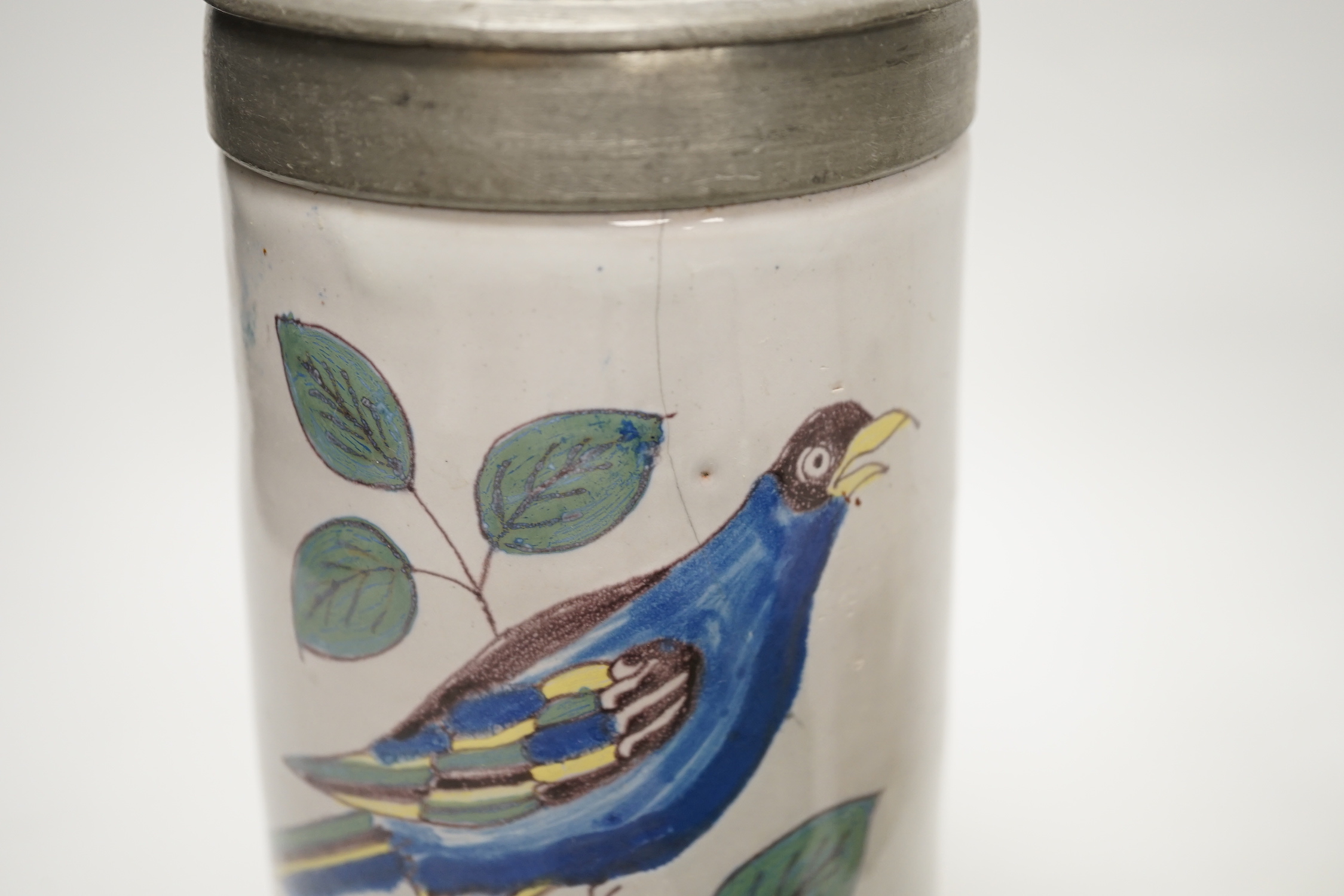 A German faience stein, dated 1819, a glass stein and an inkwell, largest 24cm